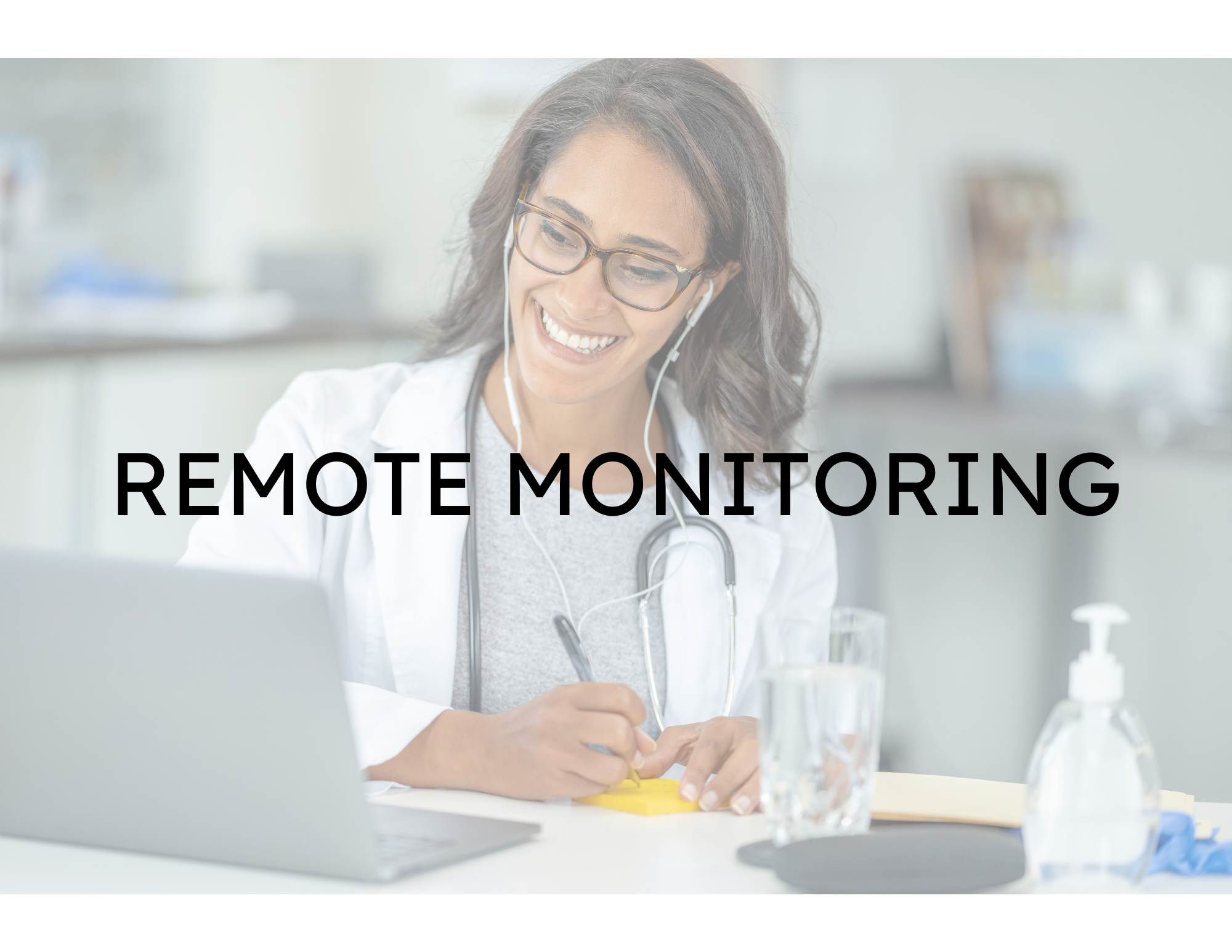 Stock photo of a doctor working with during the COVID-19 pandemic through remote monitoring.